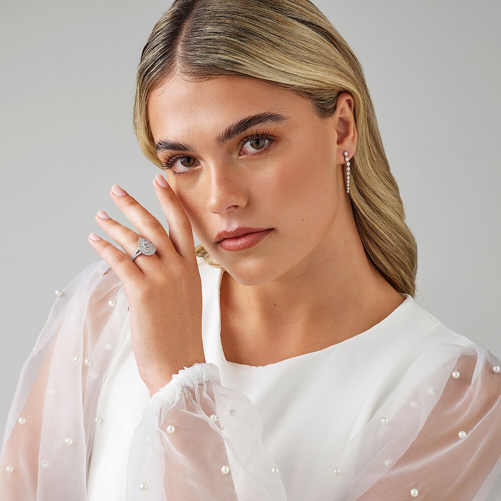 1.30 Carat TW Pear Shaped Cluster Halo Diamond Ring in 10kt White Gold