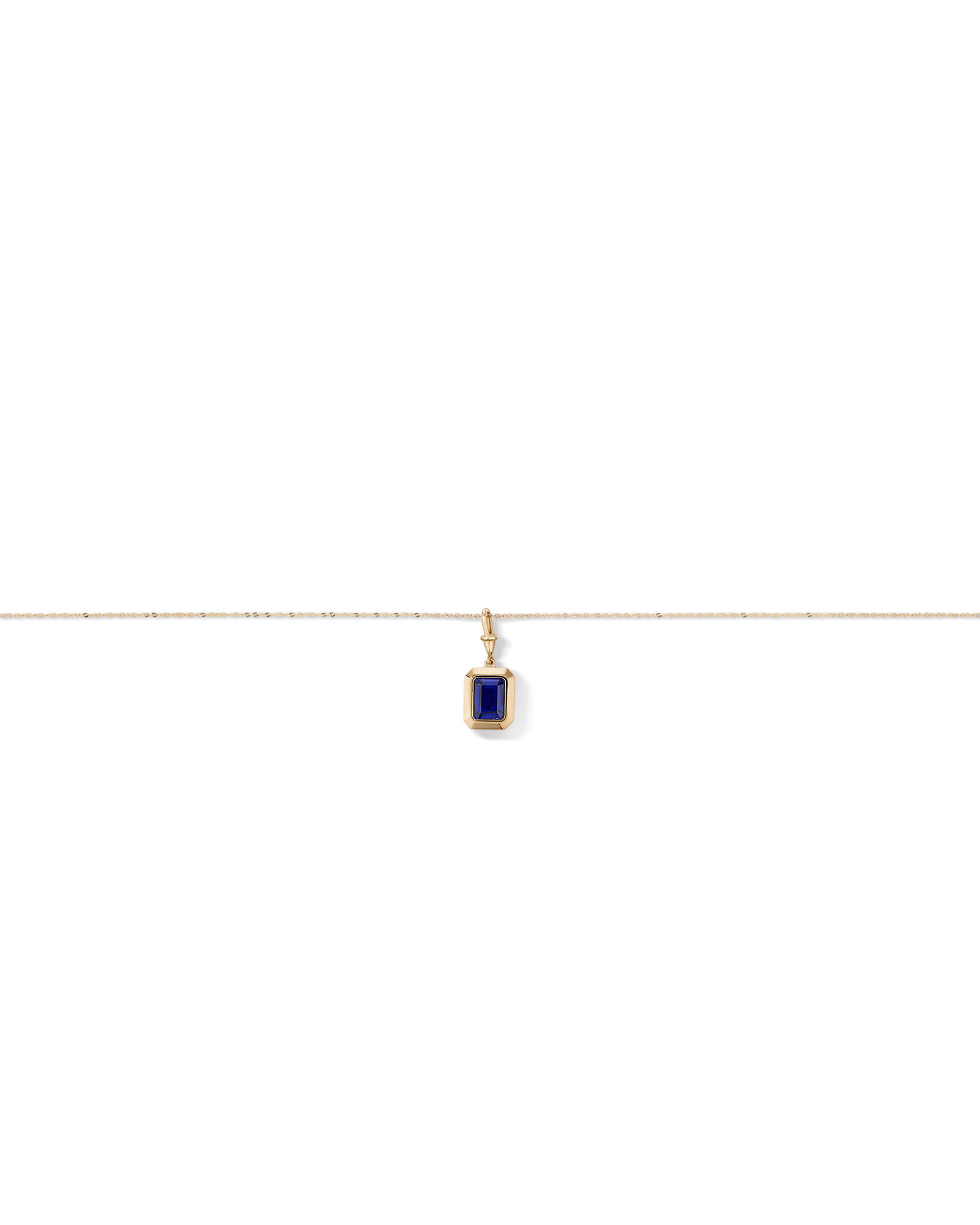 Emerald Cut Created Sapphire Bezel Pendant with Chain in 10kt Yellow Gold