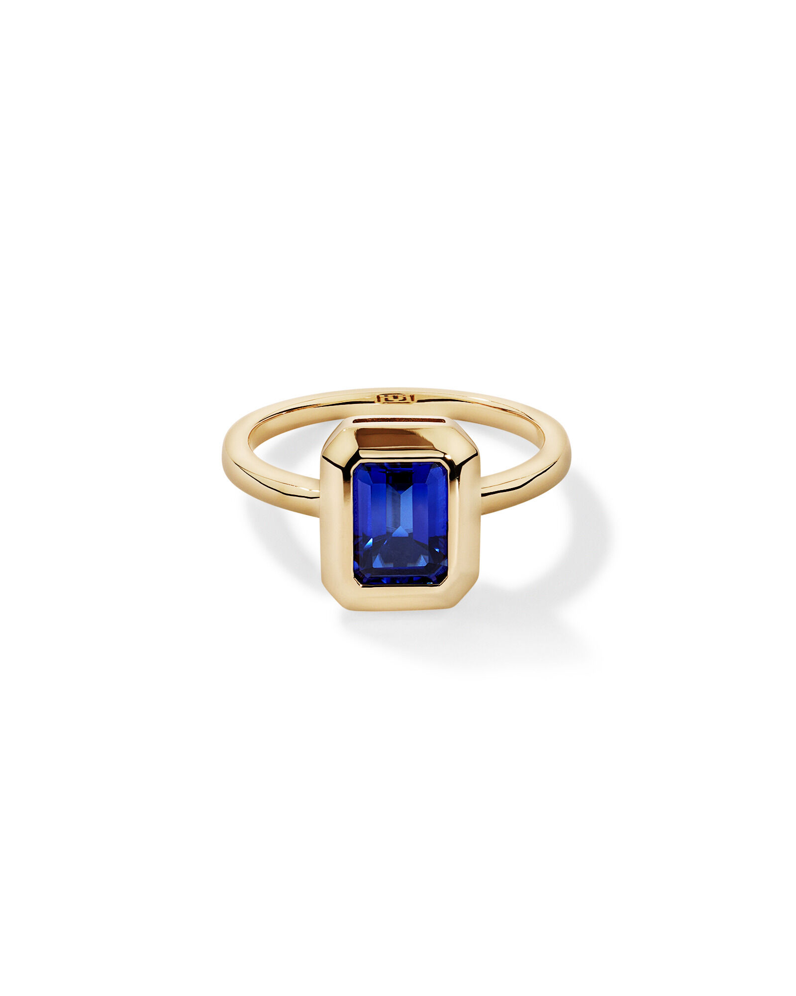 Emerarld Cut Created Sapphire Bezel Ring in 10kt Yellow Gold