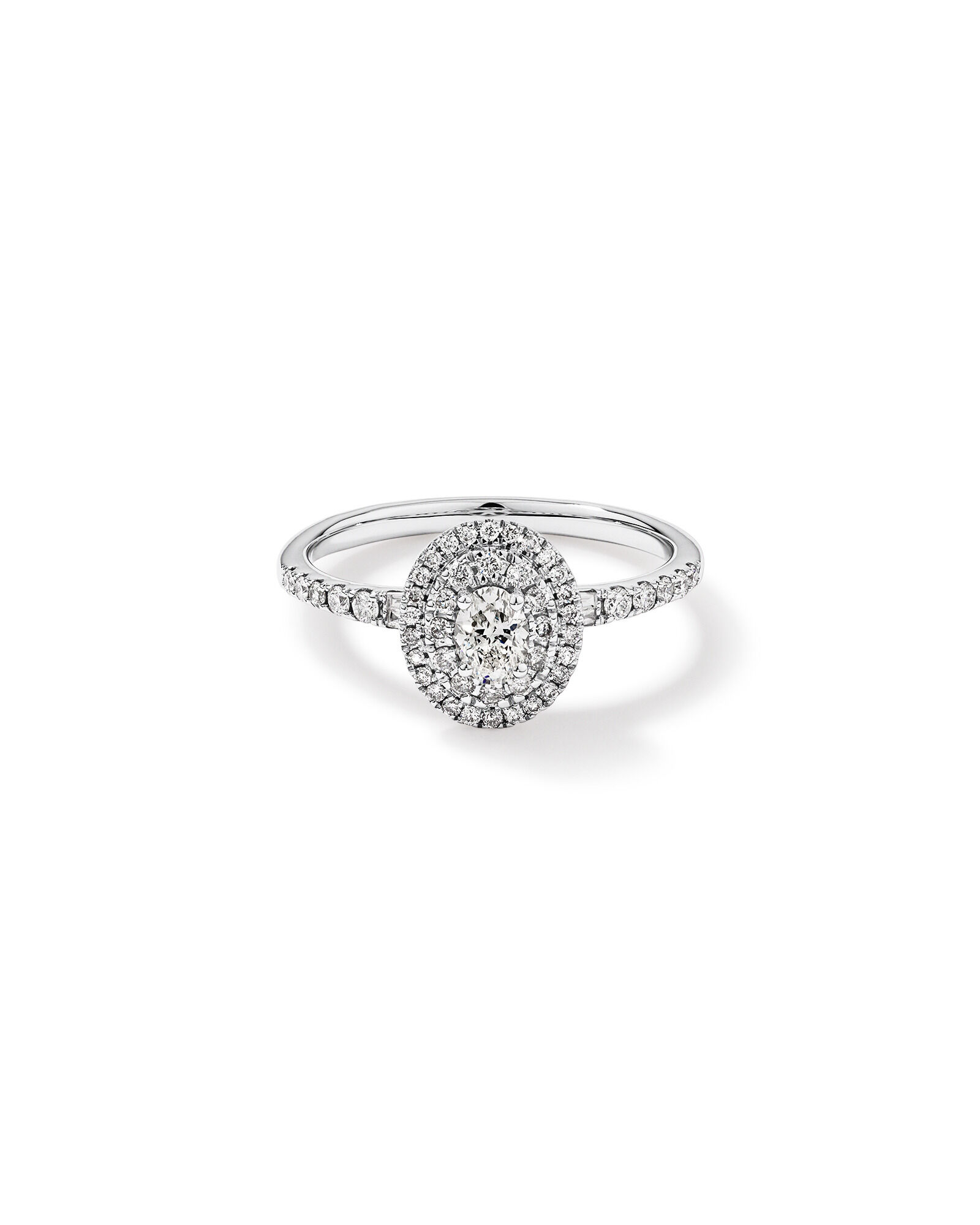 0.58 Carat TW Oval Diamond Halo Baguette Side Accent Engagement Ring in 14kt White Gold