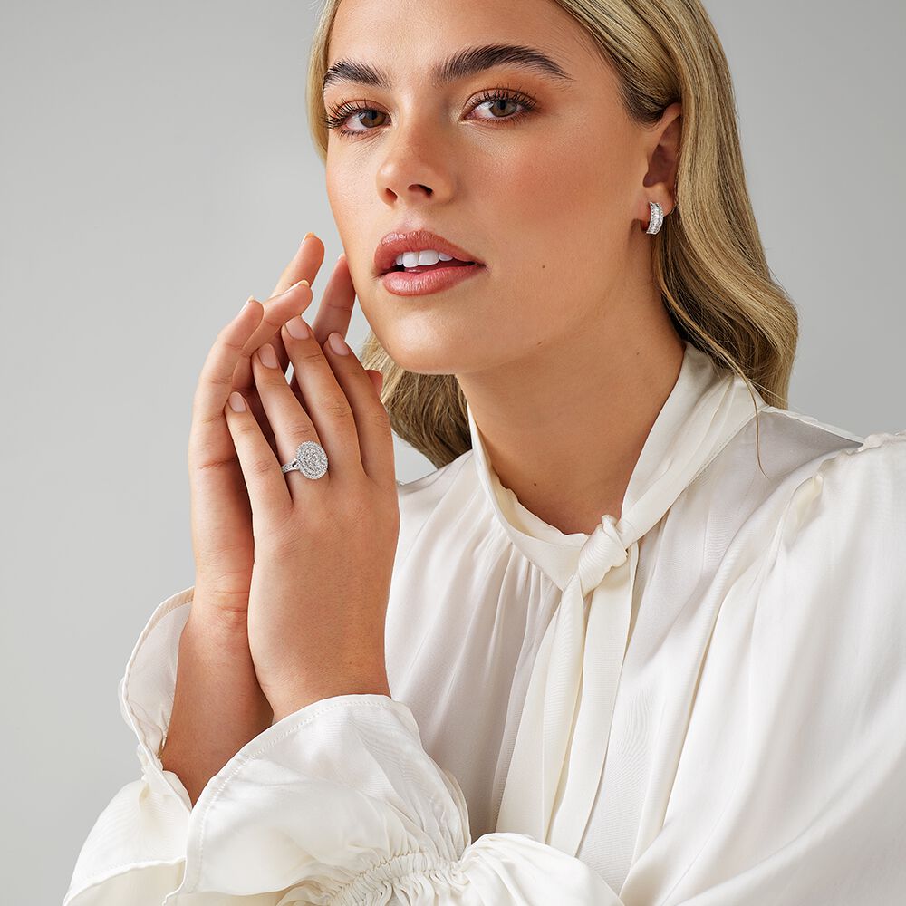 1.30 Carat TW Oval Shaped Cluster Halo Diamond Ring in 10kt White Gold