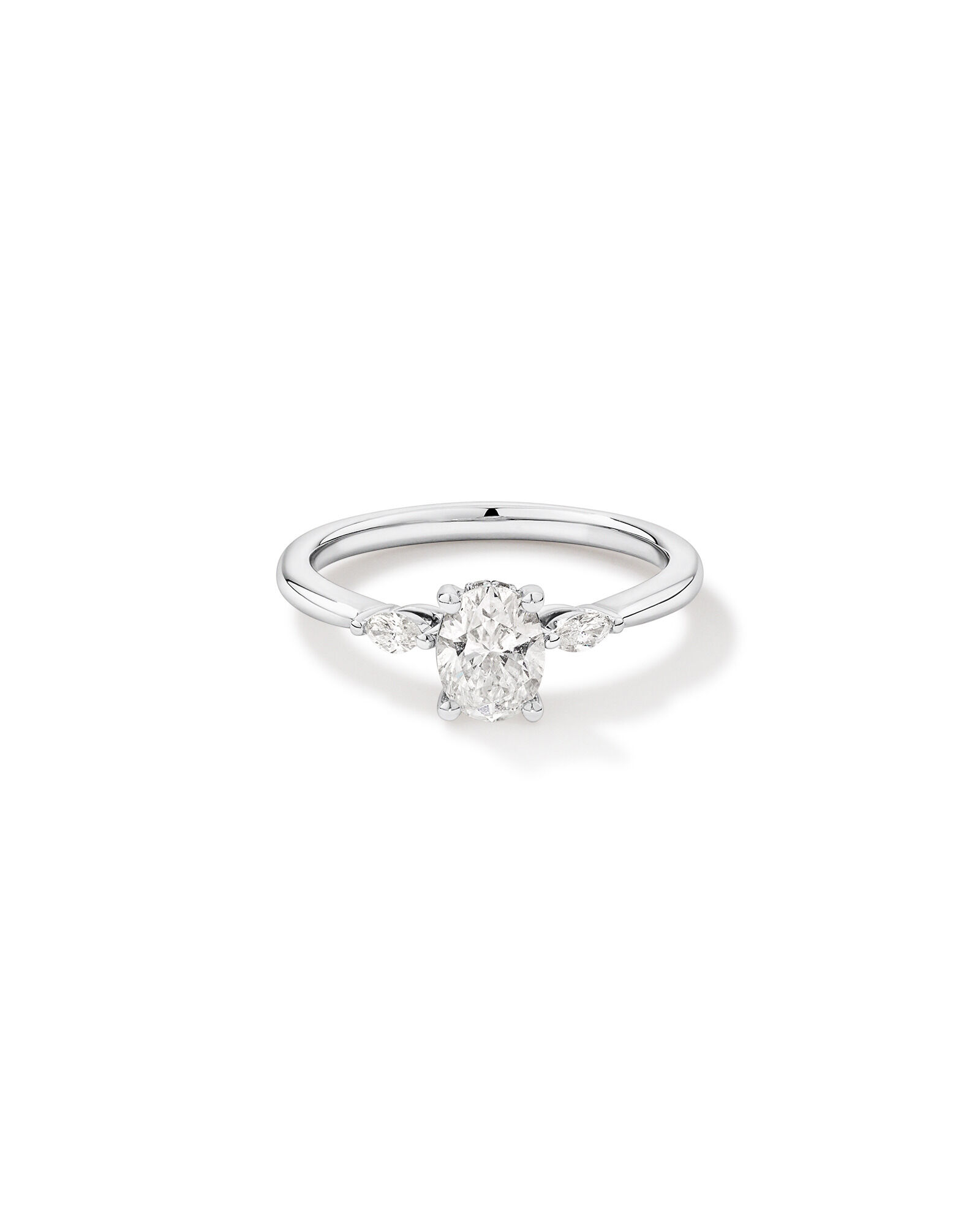 0.77 Carat TW Three Stone Oval and Marquise Cut Hidden Halo Engagement Ring in Platinum